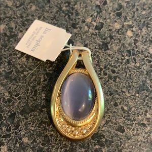 Lia Sophia gold tone pendant w/ purple stone
